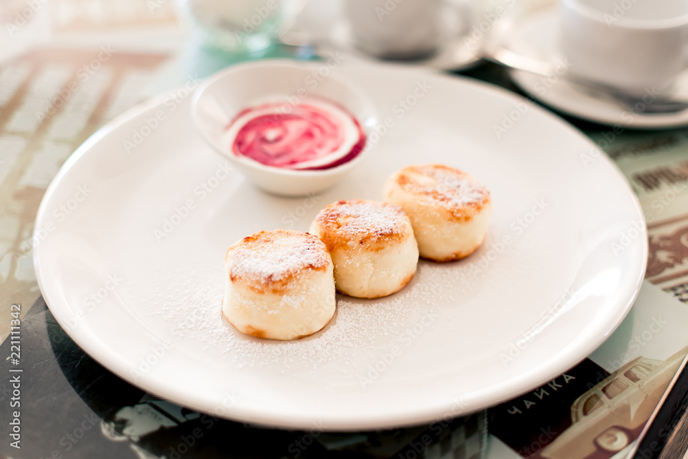 Russian syrniki or sirniki, cottage cheese pancakes