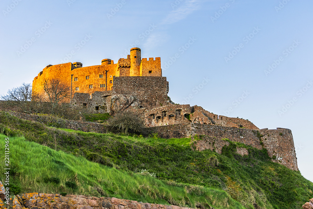 Mount Orgueil Castle (Gorey Castle, built 1204 - 1450), overlooking Grouville Bay in the small town of Gorey, Jersey, Channel Islands, United kingdom.