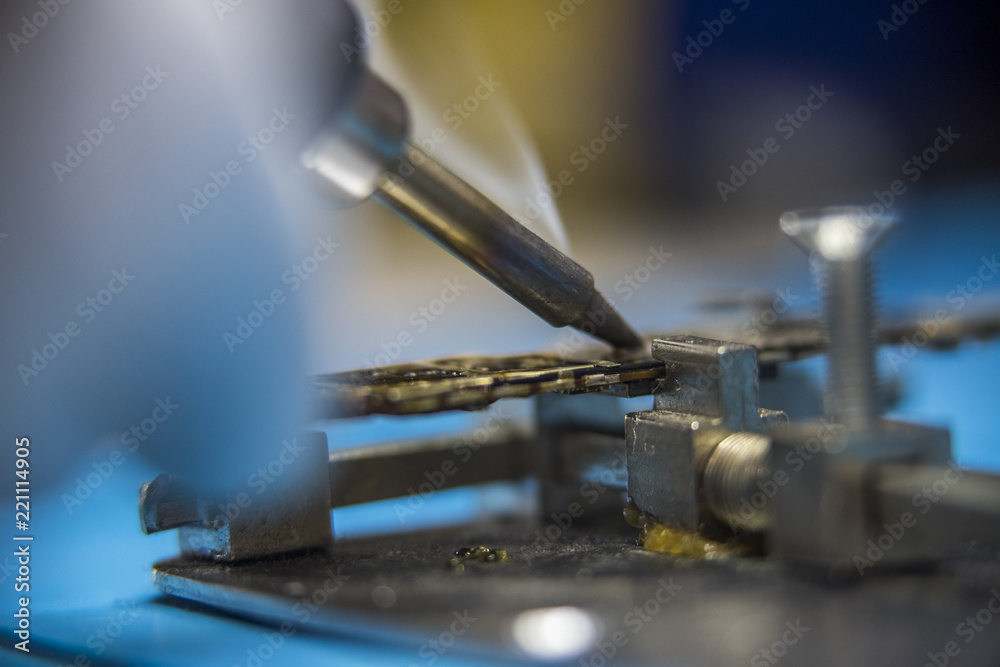welder, welding a motherboard, smoke welder, welding a motherboard, smoke