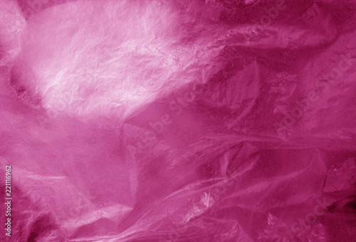 Plastic transparent old wrap texture in pink © pavelalexeev