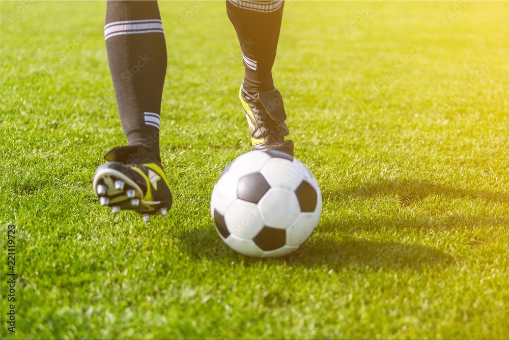 Young sporty man in uniform play soccer Young sporty man in uniform play soccer