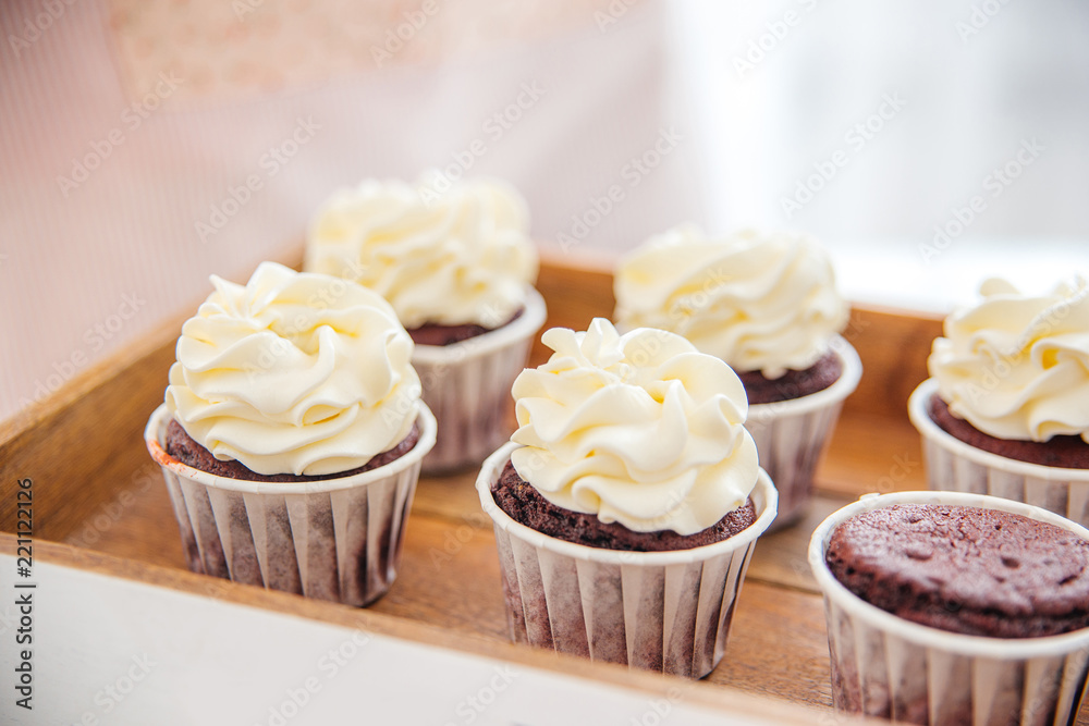 a concept of baking sweet cupcakes and muffins at home