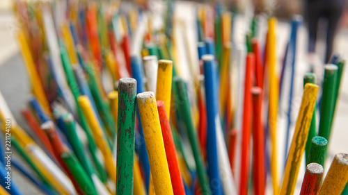 Colorful rainbow long wooden sticks