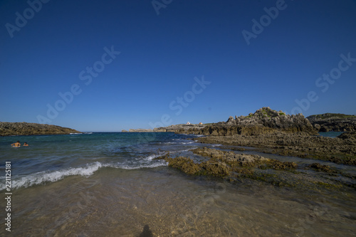 Tourism Sea, Broken coast (Costa quebrada) at Playa de San Juan de la Canal, Soto de la Marina, Spain