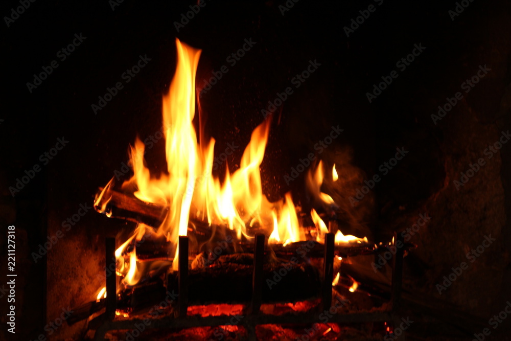 Fire crackling in the fireplace: autumn cozy atmoshpere Fire crackling in the fireplace: autumn cozy atmoshpere
