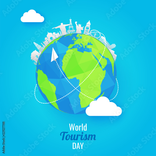 Paper cut style famous monuments of world with earth globe on shiny blue background world tourism day concept.