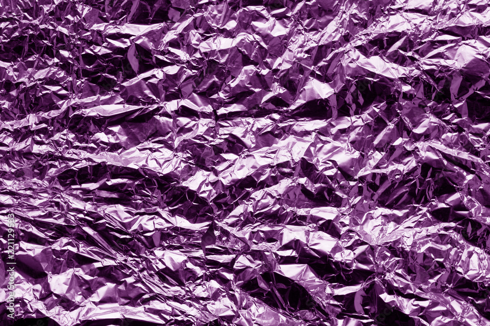 Metal foil texture in purple tone. Metal foil texture in purple tone.