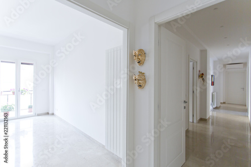Modern apartment. White corridor and room