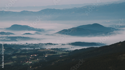 View on a hills in the valley in a morning mist