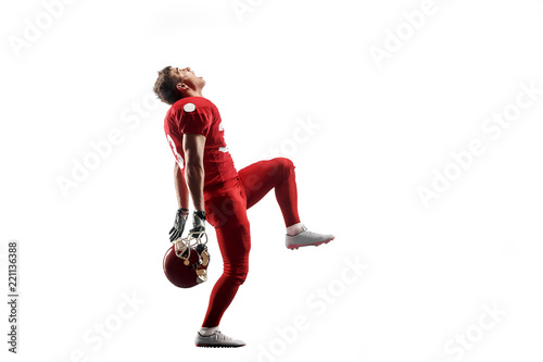 Active one american football player isolated on white background. Fit caucasian man in uniform posing as winner over studio background. Win, Human emotions and facial expressions concept photo