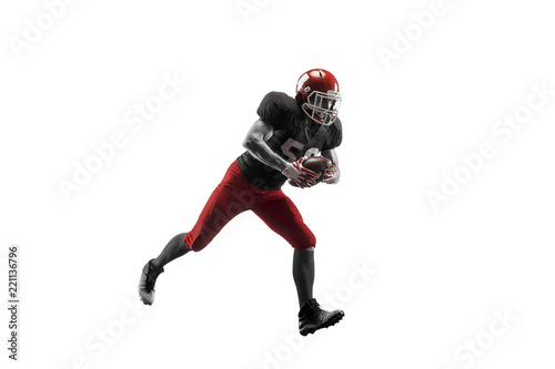 Active one american football player isolated on white background. Fit caucasian man in uniform running over studio background in jump or motion. Human emotions and facial expressions concept