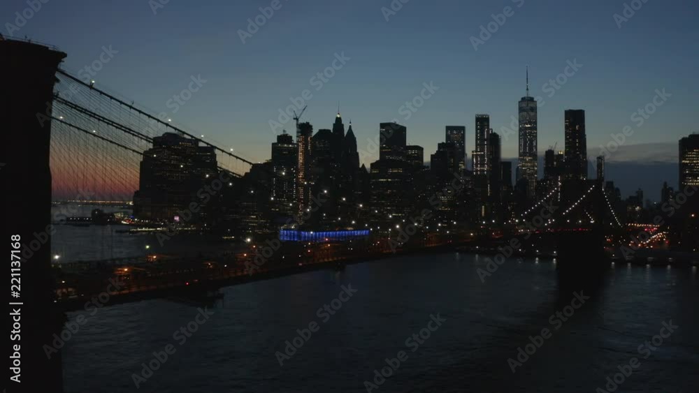 night shot of downtown Manhattan flying left to reveal Bkln Bridge night shot of downtown Manhattan flying left to reveal Bkln Bridge
