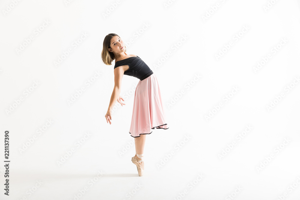 Ballerina Performing Backbend On White Background Ballerina Performing Backbend On White Background