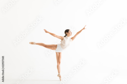 Graceful Ballerina Doing A Ballet Pose Called Arabesques