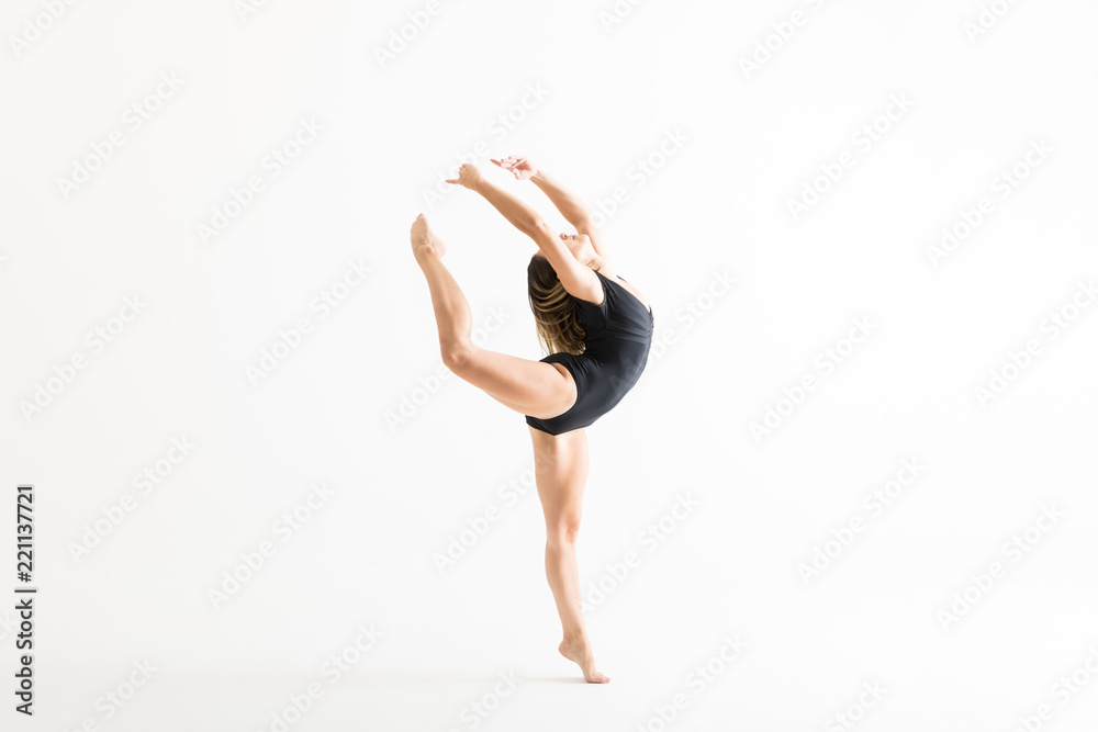 Ballerina In Black Leotard Practicing Ballet Moves Ballerina In Black Leotard Practicing Ballet Moves