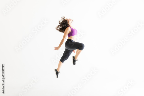 Side View Of Energetic Woman Performing Jazz Dance