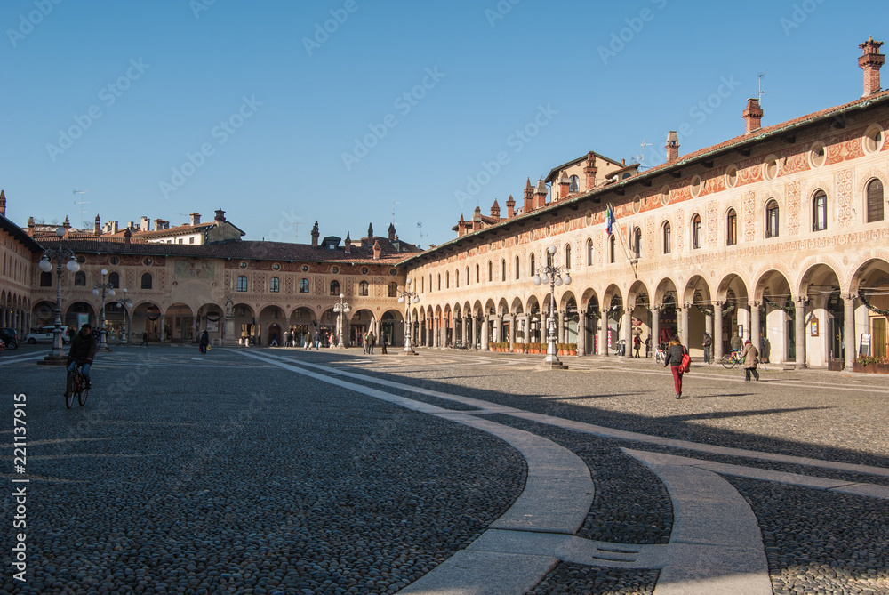 Ducale square with original greek frescoes  on historic buildings in Vigevano