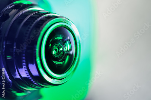 Side view of the camera with green backlight. Horizontal photography