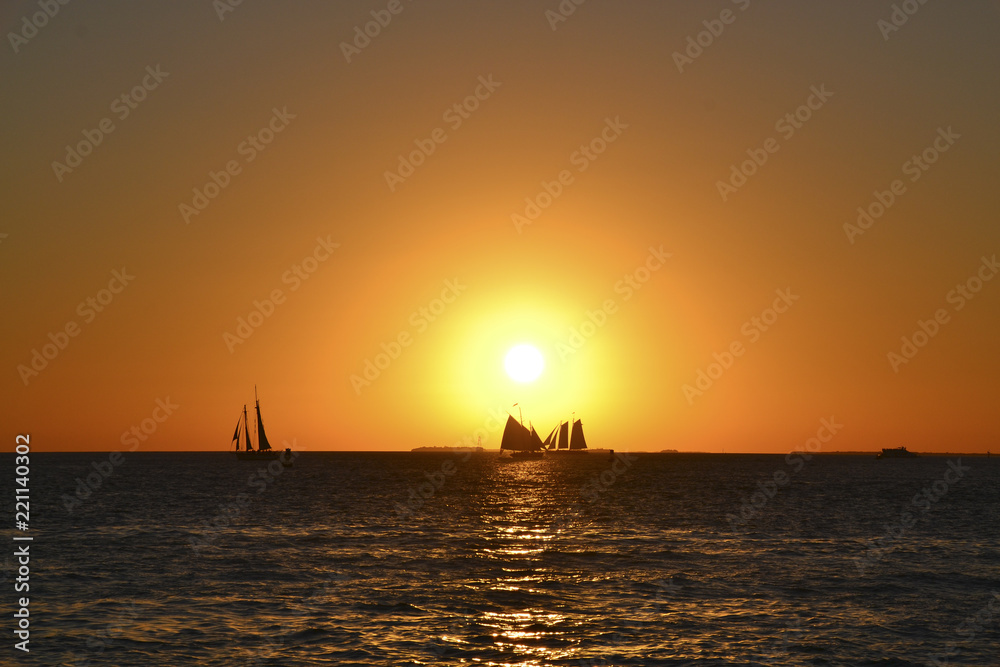 Beautiful sunset on the ocean,with some boats, in Key West,USA