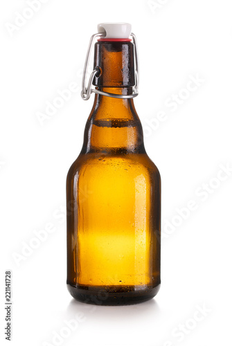 Small closed brown swing top bottle isolated on white background