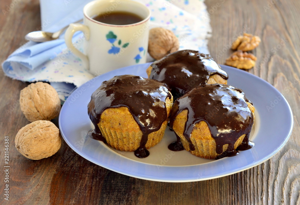 Pumpkin muffins with chocolate glaze Pumpkin muffins with chocolate glaze
