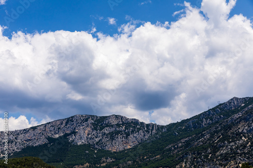 picturesque rocky mountains and blue sky with clouds, provence, france © LIGHTFIELD STUDIOS