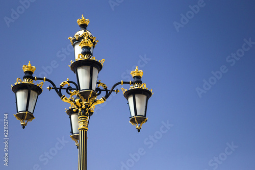 old-fashioned street lamp decorated by gold © bulgn