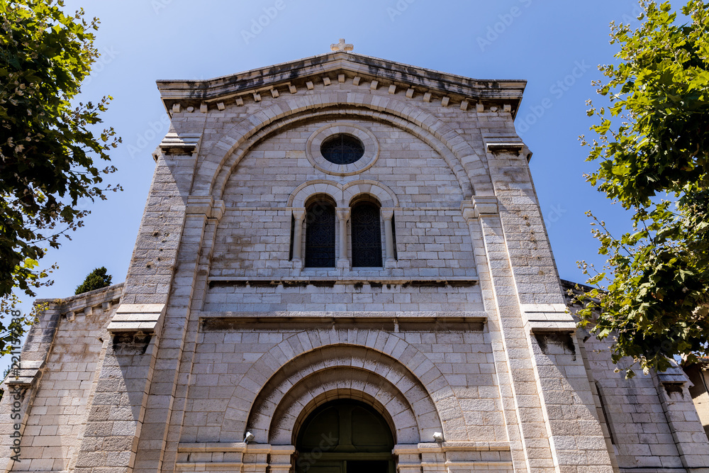 low angle view of old historic church against blue sky, provence, france