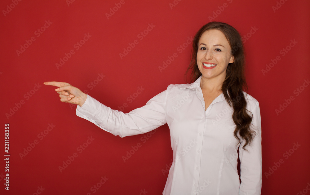 Smiling businesswoman showing open hand palm with copy space for Smiling businesswoman showing open hand palm with copy space for