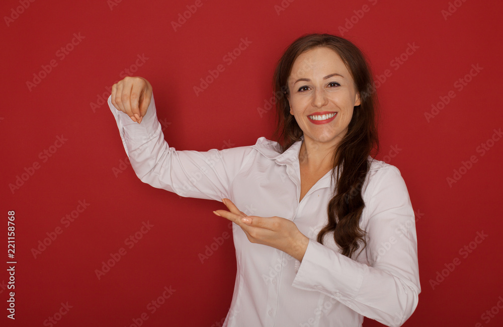 Beautiful woman showing / presenting something on the palm of her hand Beautiful woman showing / presenting something on the palm of her hand