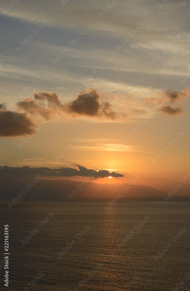 Sunset in the clouds over Gomera Island, Tenerife, Canary, Spain. Sunset in the clouds over Gomera Island, Tenerife, Canary, Spain.
