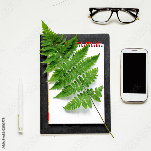 Busines flat lay of office stuff on white table photo