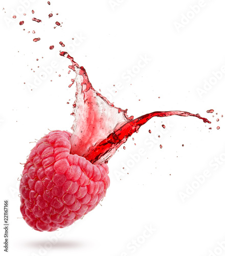 red juice splashing out of a raspberry isolated on white background.