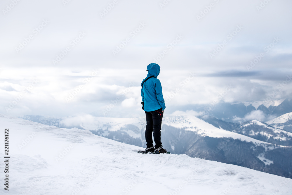 Girl standing on mountains