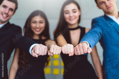 power friendship business people partner hand punch together successful ideas concept