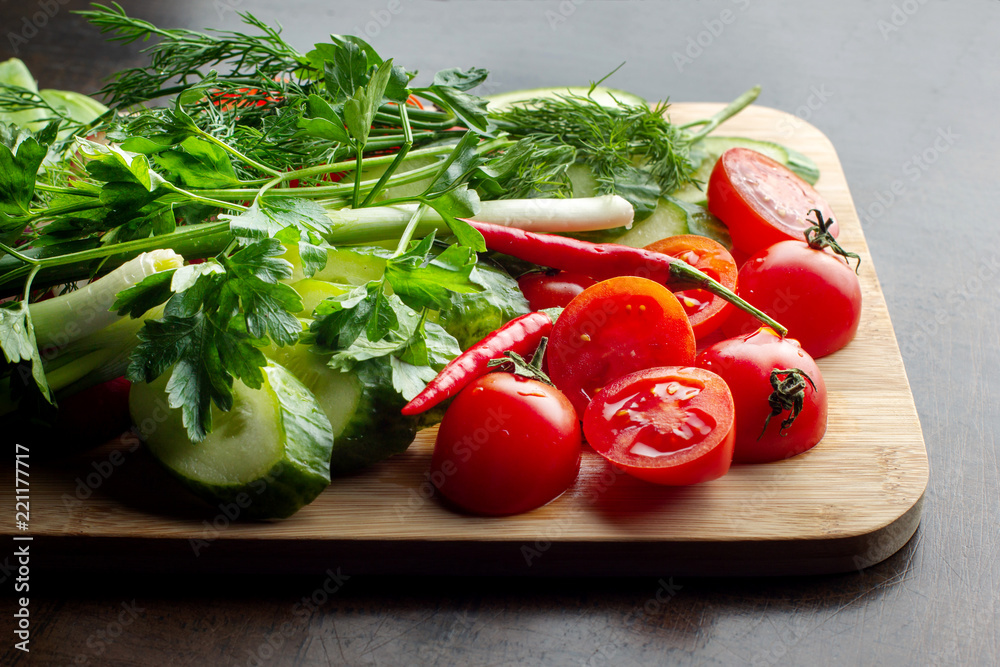 Wooden plank with vegetables for a vegetarian salad. Wooden plank with vegetables for a vegetarian salad.