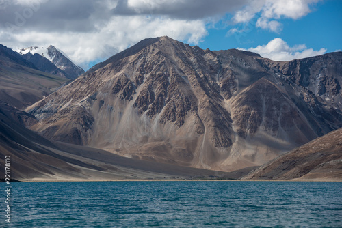 View point at Pangong Lake with blue and turquoise water, Himalaya mountain, sky and cloud background in summer