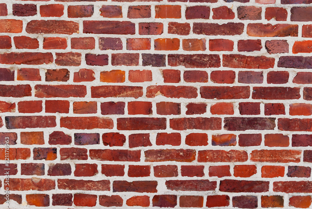 Wall with red and blown bricks Wall with red and blown bricks