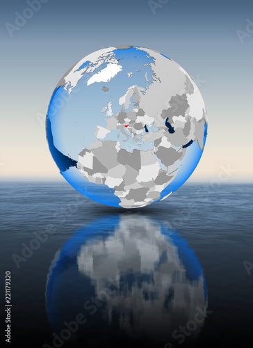 Slovenia on globe in water