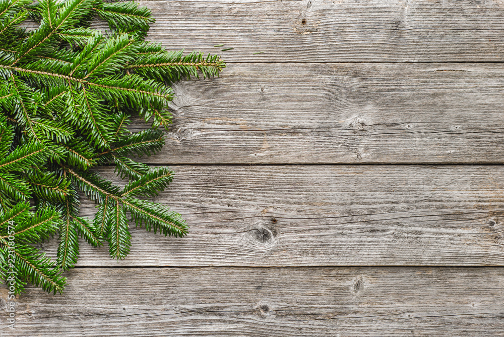 Christmas fir tree branches on wooden background, copy space Christmas fir tree branches on wooden background, copy space