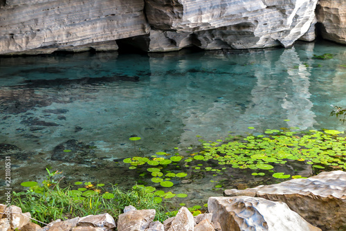 Crystal clear lake inside the cave of the Pratinha, Chapada Diamantina, Bahia, Brazil photo