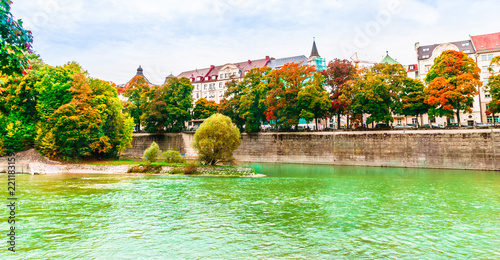 Colorful autumn landscape of Isar river in Lehel Munich, Bavaria - Germany photo