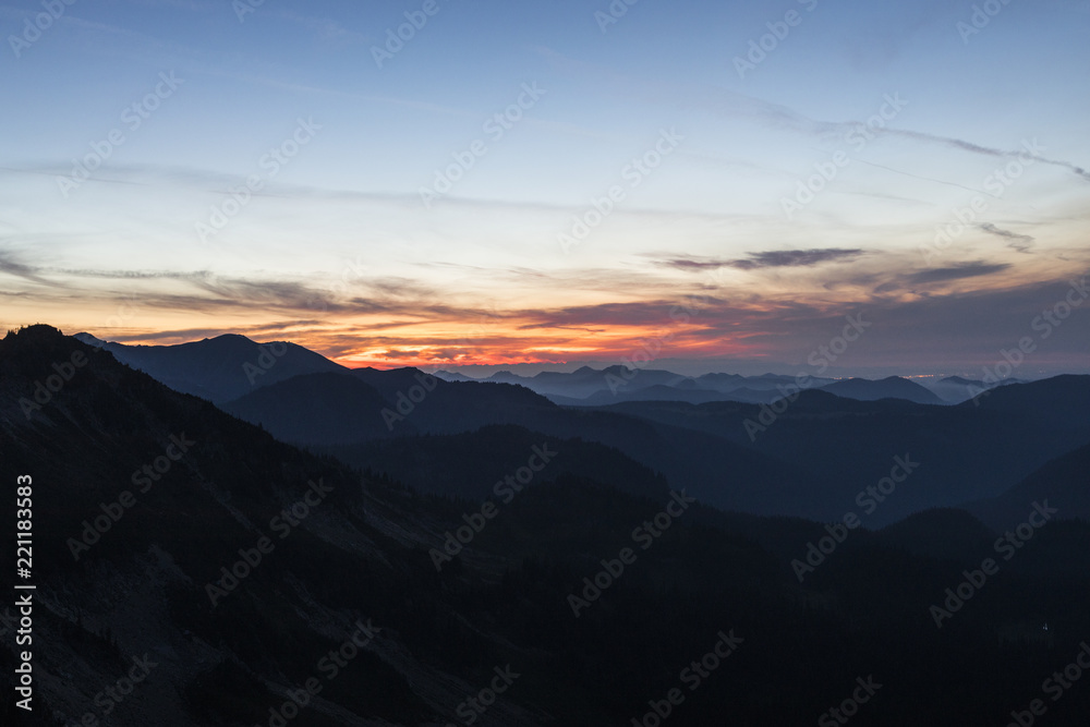 Burning sky over mountains during sunset