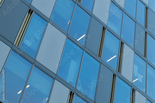 Business architecture building with glass windows and dynamic lines