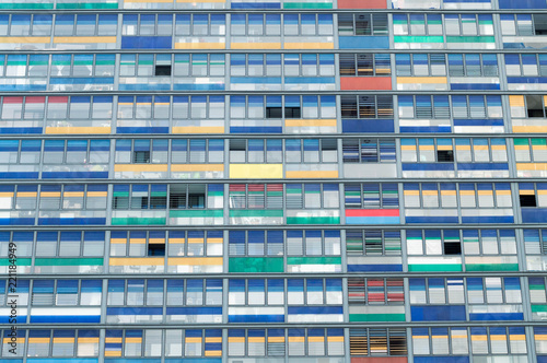 Architectural residential tower with colours on balconies 