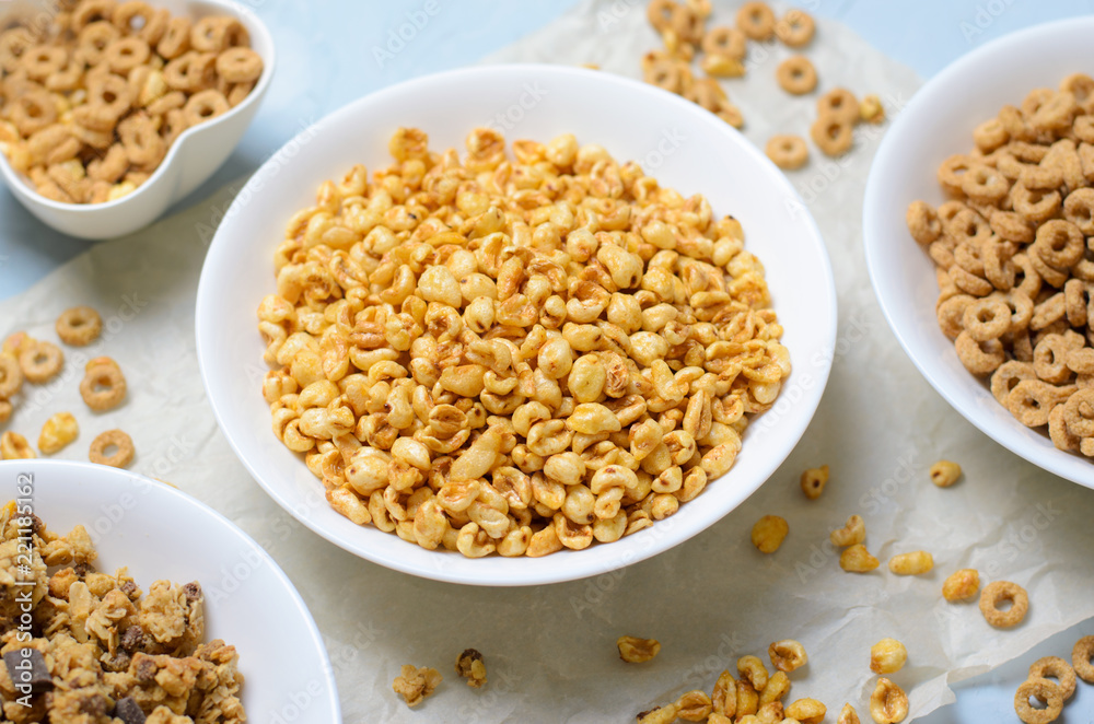Puffed Rice and Bowls of Different Kinds of Cereals, Quick Breakfast Puffed Rice and Bowls of Different Kinds of Cereals, Quick Breakfast