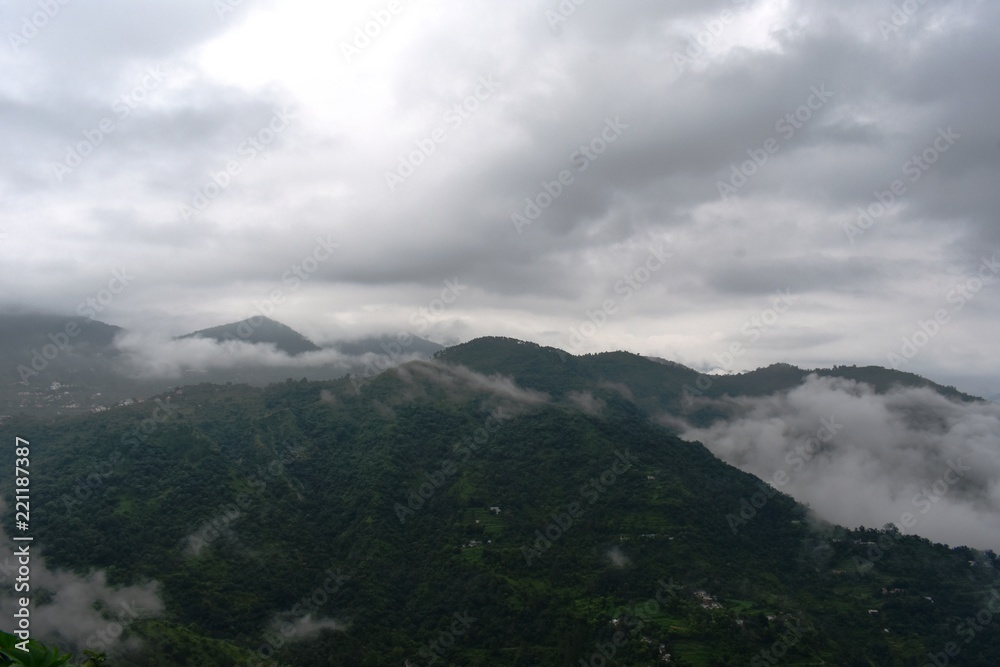 clouds in mountains in landscape