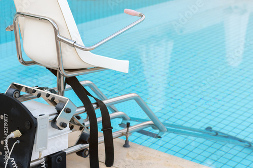 A chair for bathing invalids in the pool