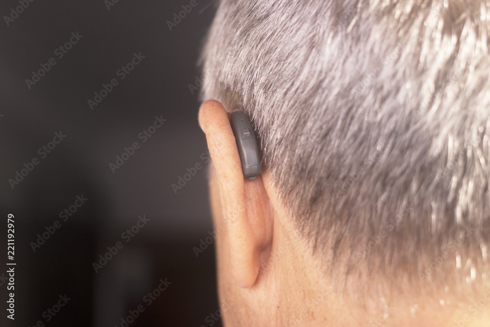 Fototapeta premium Deaf man hearing aid ear