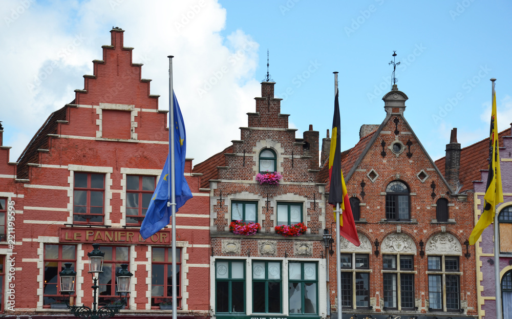 Bruges, Belgium - August 25, 2018: Grote Markt square in medieval city Brugge, Flanders, Belgium. Bruges, Belgium - August 25, 2018: Grote Markt square in medieval city Brugge, Flanders, Belgium.